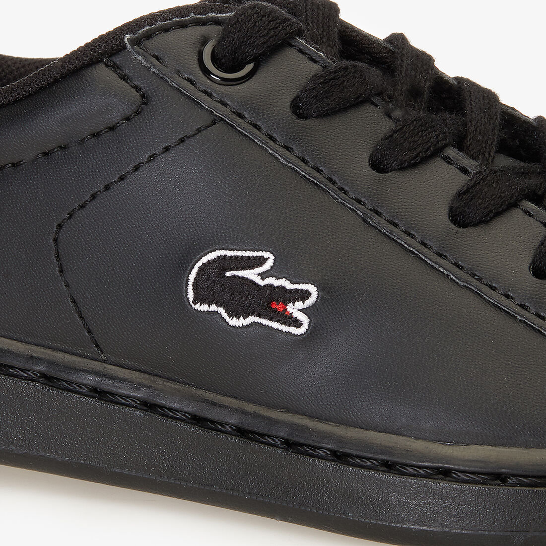 حذاء رياضي بأربطة من مواد صناعية وبطانة شبكية مجموعة Carnaby Evo للأطفال حذاء رياضي بأربطة من مواد صناعية وبطانة شبكية مجموعة Carnaby Evo للأطفال