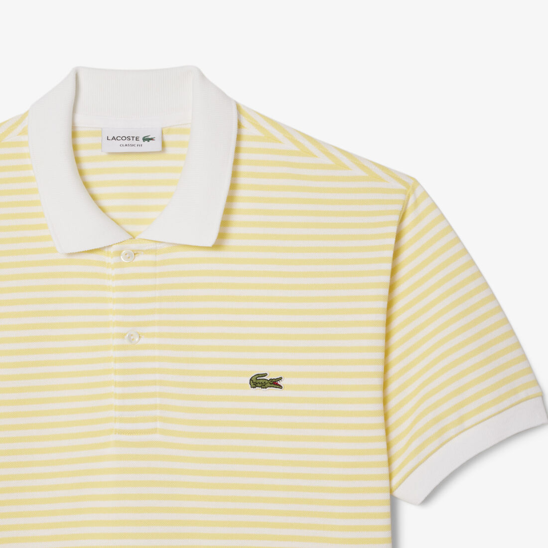 قميص بولو مخطط بيتي بيكيه بقصة كلاسيكية L.12.12 قميص بولو مخطط بيتي بيكيه بقصة كلاسيكية L.12.12