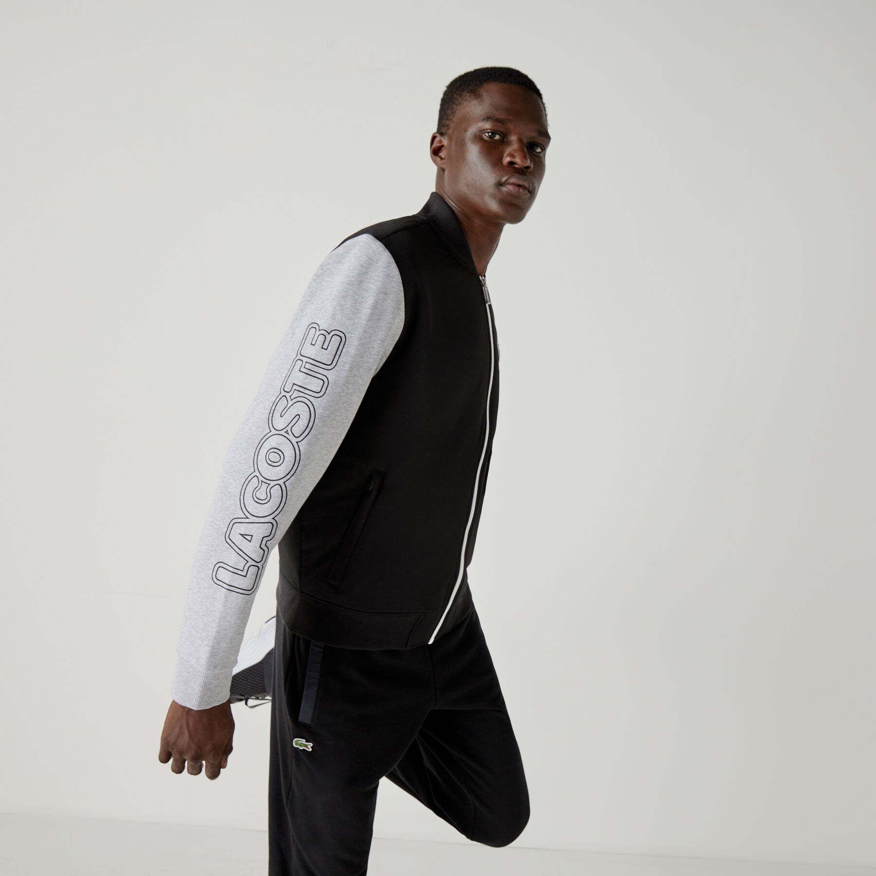جاكيت تيدي بسحاب من الصوف مع طبعة ثنائية اللون للرجال من مجموعة Lacoste SPORT لاكوست جاكيت تيدي بسحاب من الصوف مع طبعة ثنائية اللون للرجال من مجموعة lacoste sport