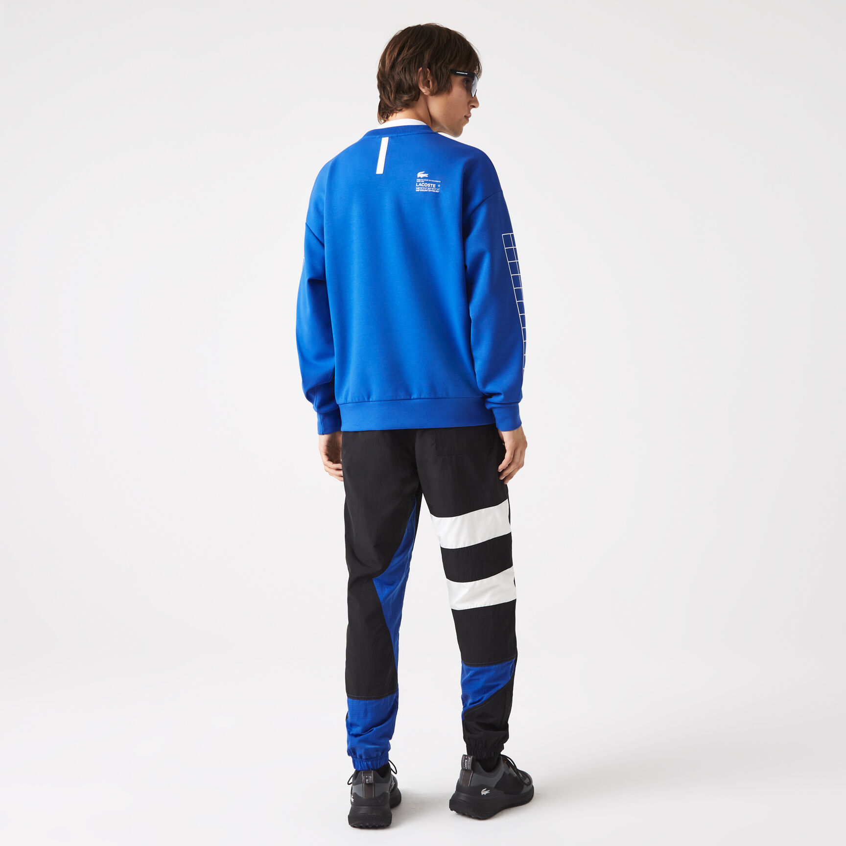 سويت شيرت لاكوست قماش بيكيه بطبقتين وقصة فضفاضة للرجال