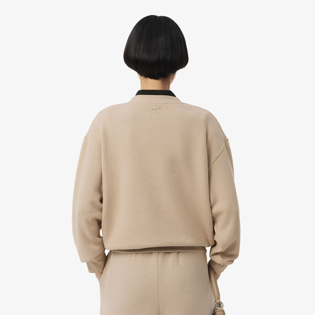 قميص رياضي واسع من قماش إنترلوك قميص رياضي واسع من قماش إنترلوك