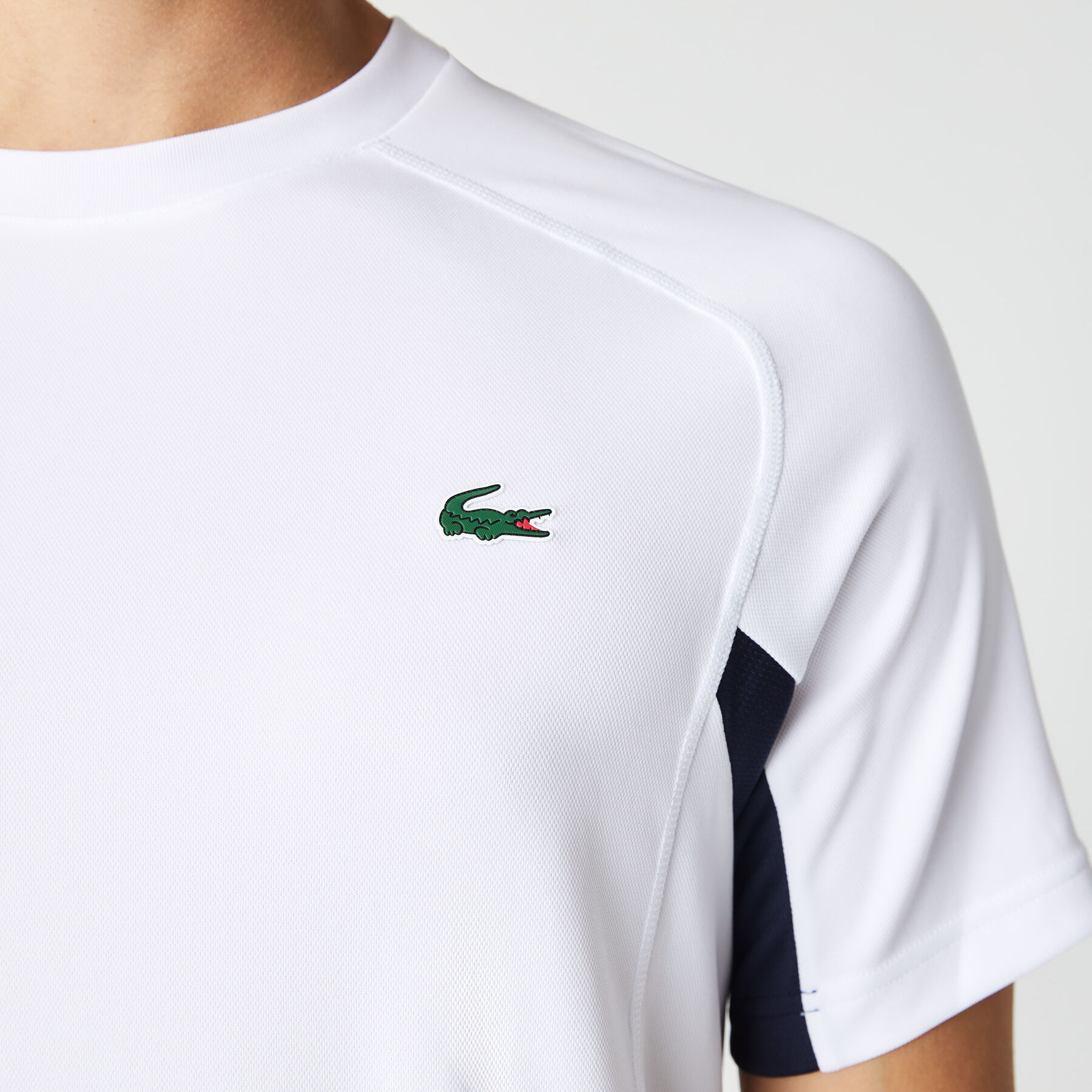لاكوست تيشيرت تنس بيكيه سريع الجفاف بتصميم مقسم بألوان للرجال مجموعة lacoste sport