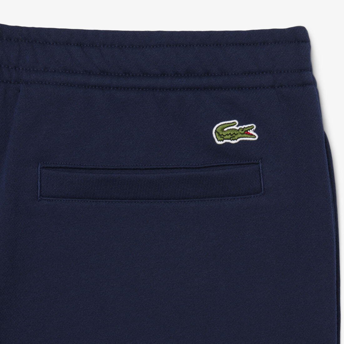 lacoste embossed branding sweatpants