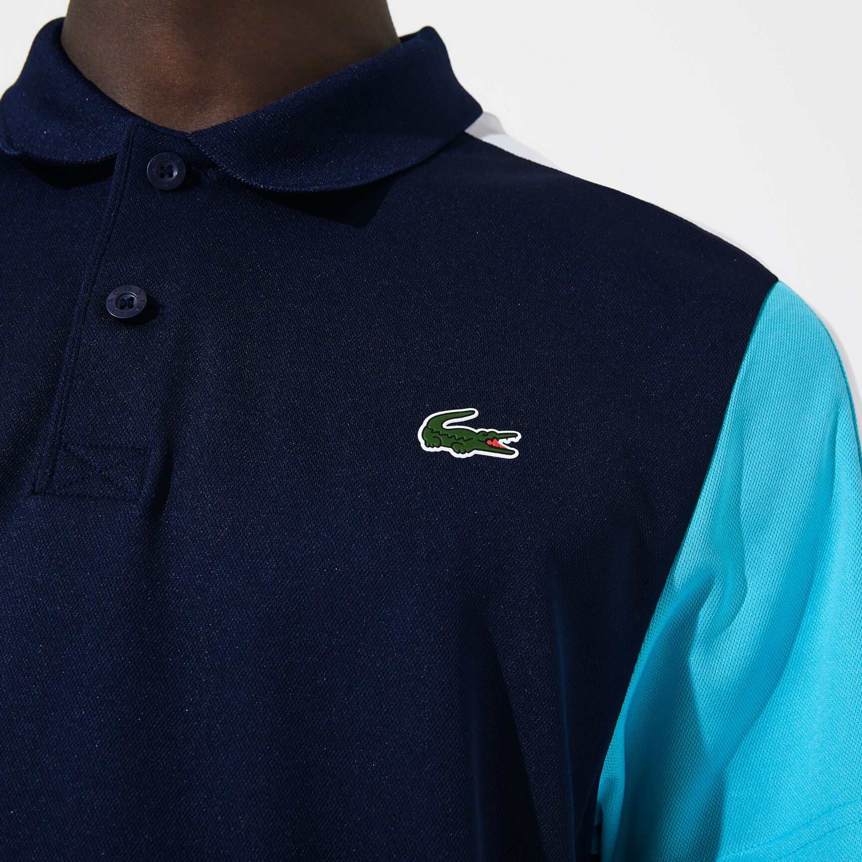 قميص بولو من مجموعةLacoste SPORT محيك من البيكيه ويسمح بمرور الهواء للرجال قميص بولو من مجموعةLacoste SPORT محيك من البيكيه ويسمح بمرور الهواء للرجال