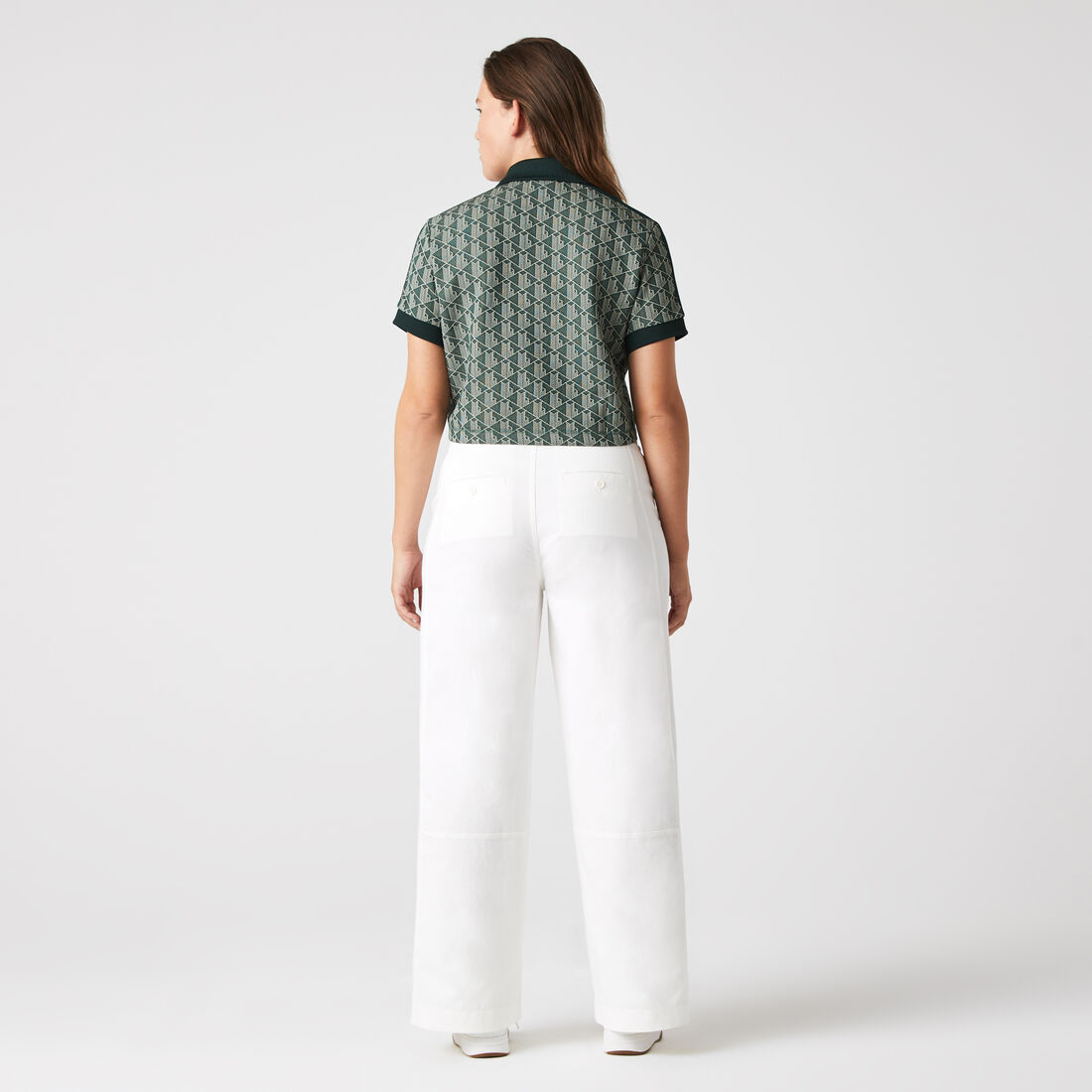 تيشيرت بولو بقصة عادية وياقة بلون مغاير ونقشة شعار الماركة للنساء تيشيرت بولو بقصة عادية وياقة بلون مغاير ونقشة شعار الماركة للنساء