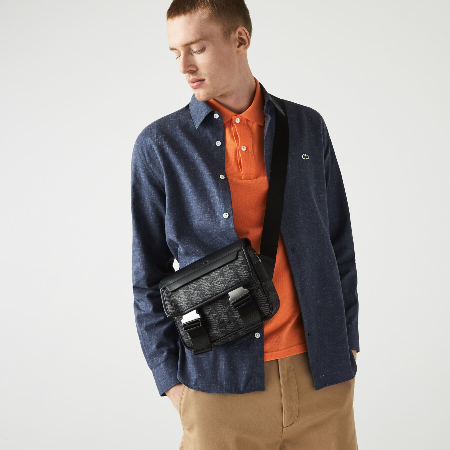 lacoste men s the blend clipped monogram canvas messenger bag