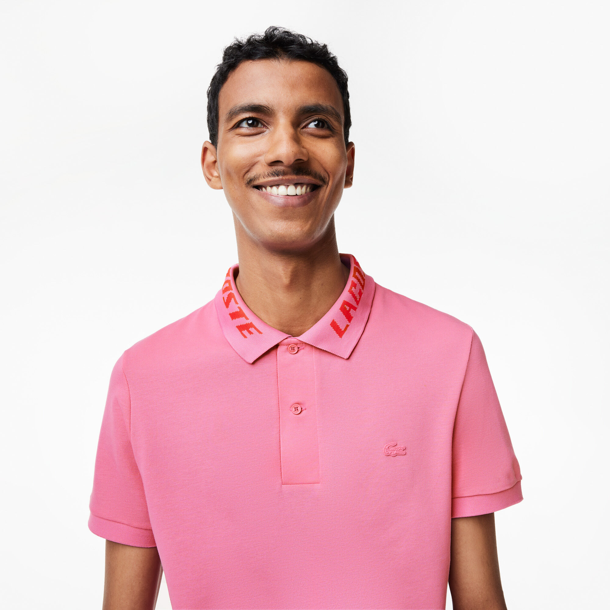 Lacoste salmon hotsell pink polo