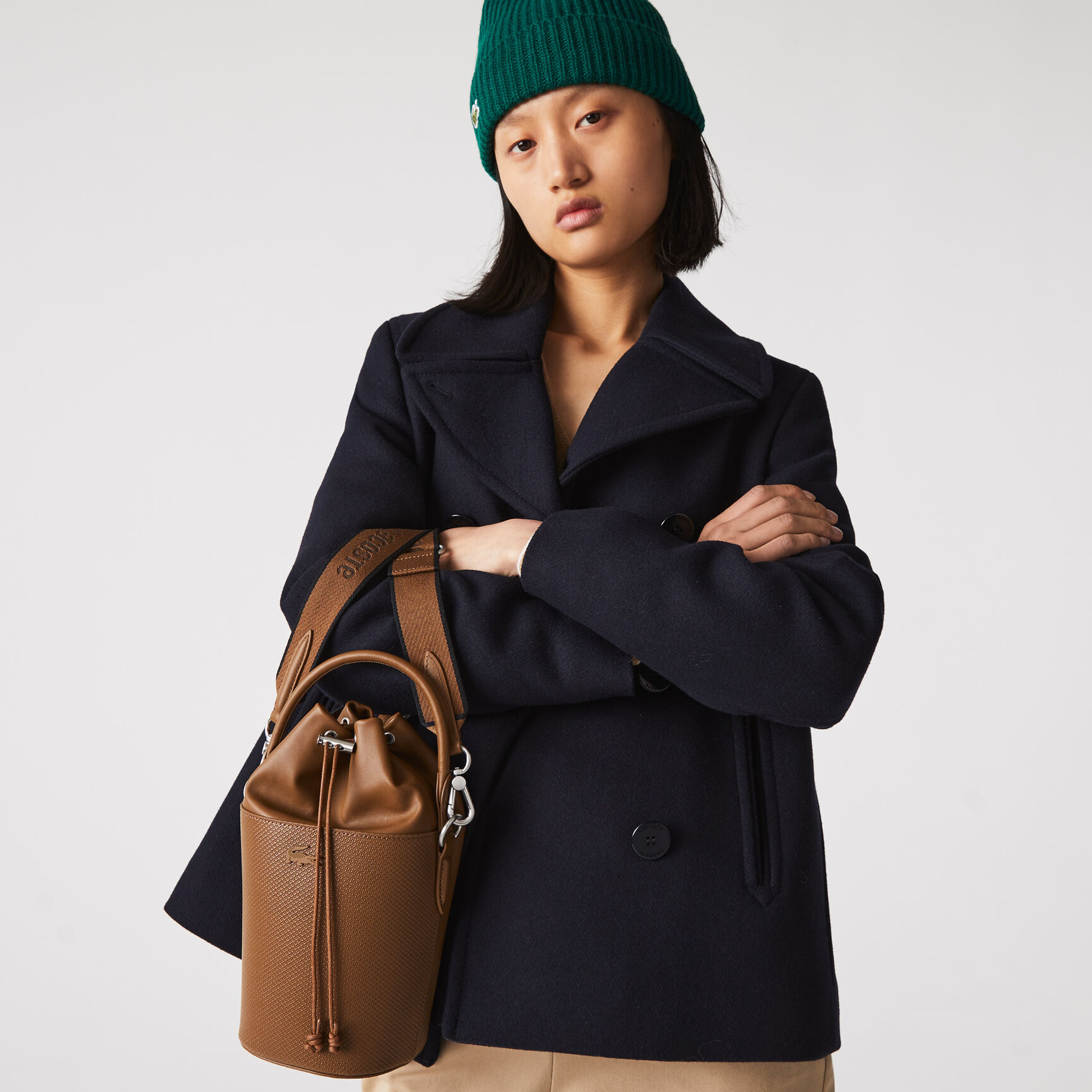 حقيبة دلو جلد بيكيه صغيرة بحزام كتف للسيدات من مجموعة Chantaco حقيبة دلو جلد بيكيه صغيرة بحزام كتف للسيدات من مجموعة Chantaco