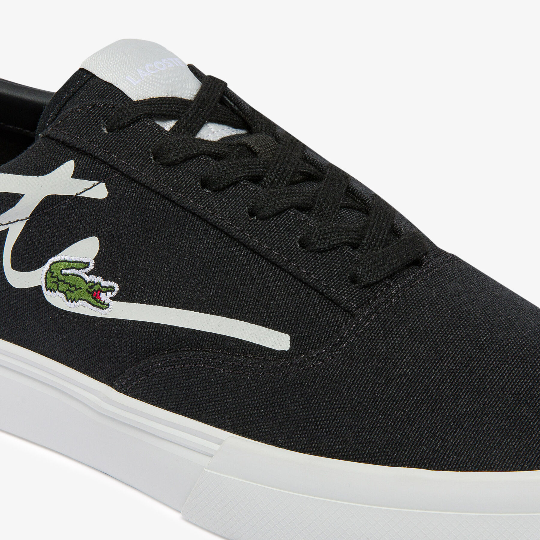 Men's Jump Serve Lace Canvas Trainers lacoste men s jump serve lace canvas trainers
