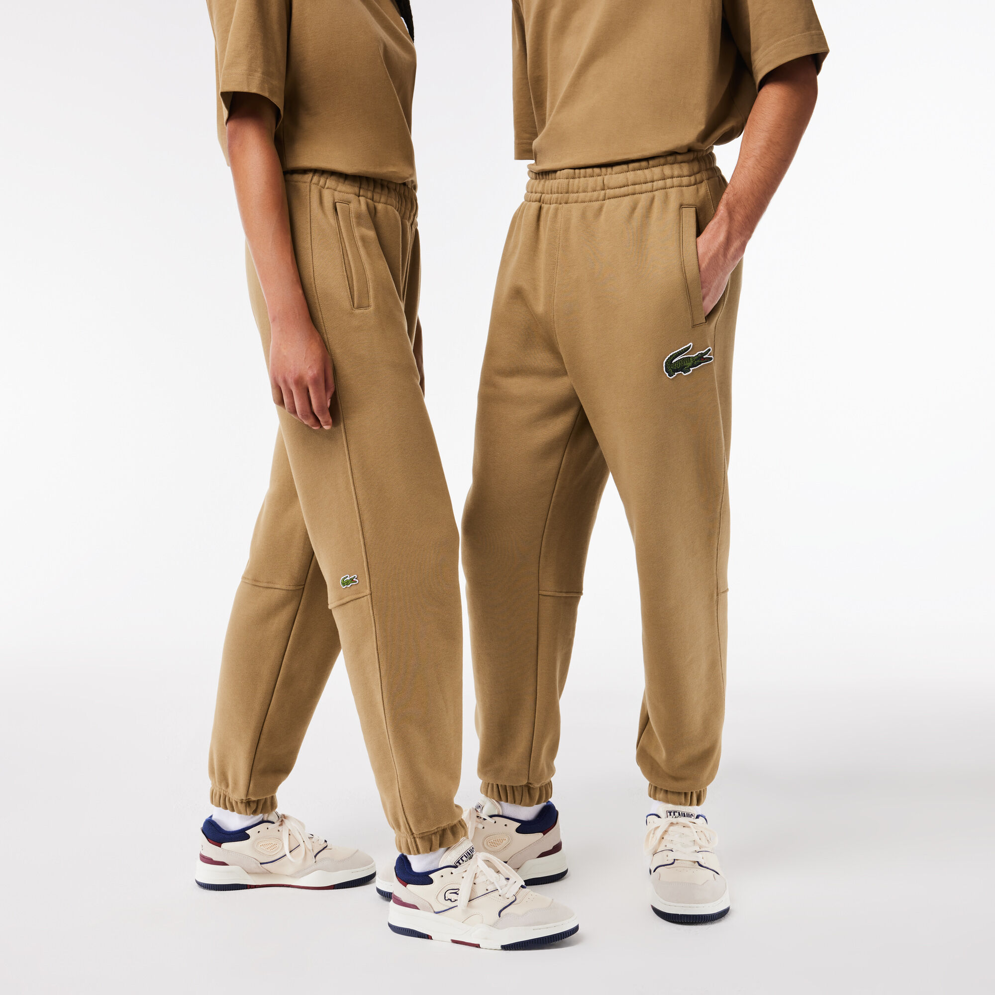 Orange lacoste joggers 2025