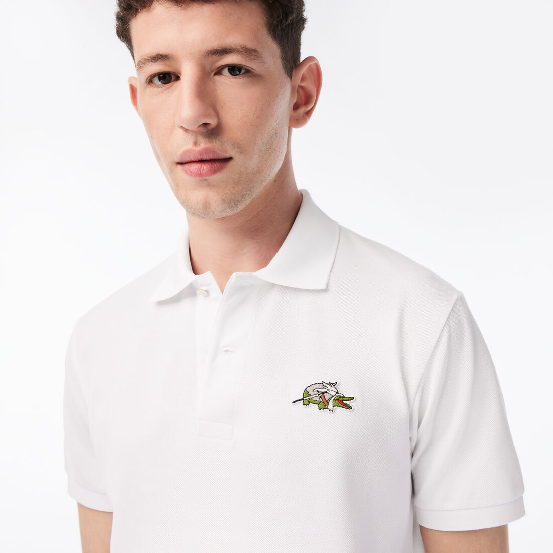 تيشيرت بولو قطن عضوي للرجال مجموعة Lacoste x Netflix تيشيرت بولو قطن عضوي للرجال مجموعة Lacoste x Netflix