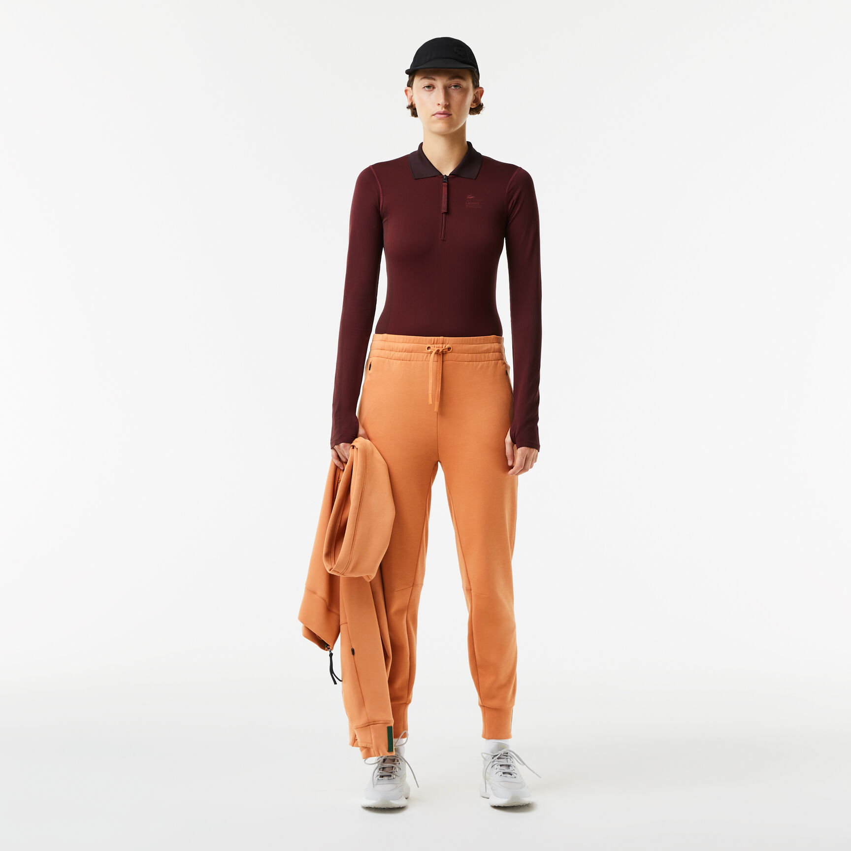 بودي سوت لاكوست بسحّاب على الياقة للنساء