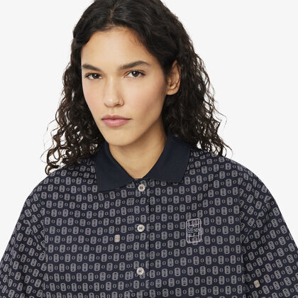 lacoste oversized tennis print polo