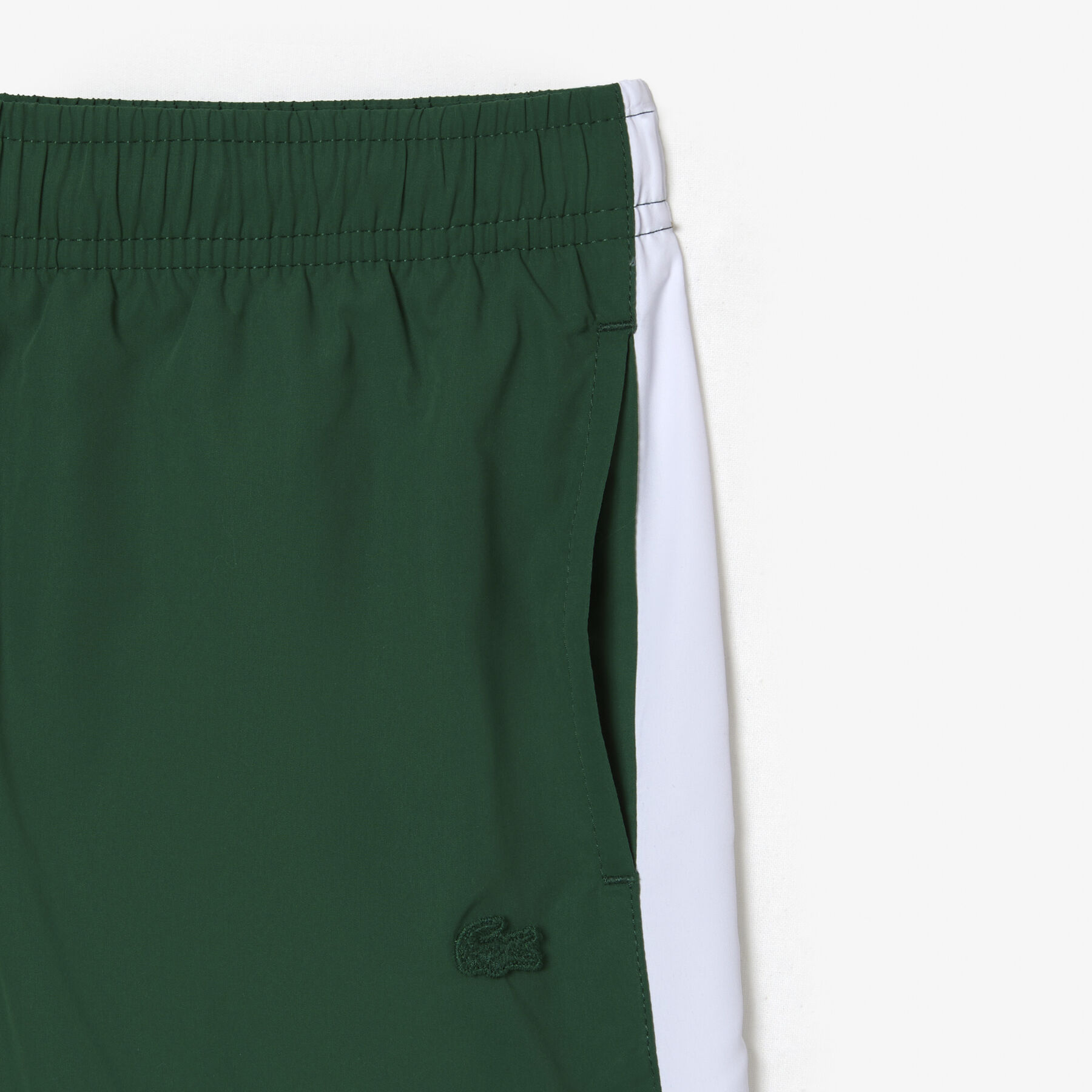 boy s lacoste x netflix contrast badge swim trunks
