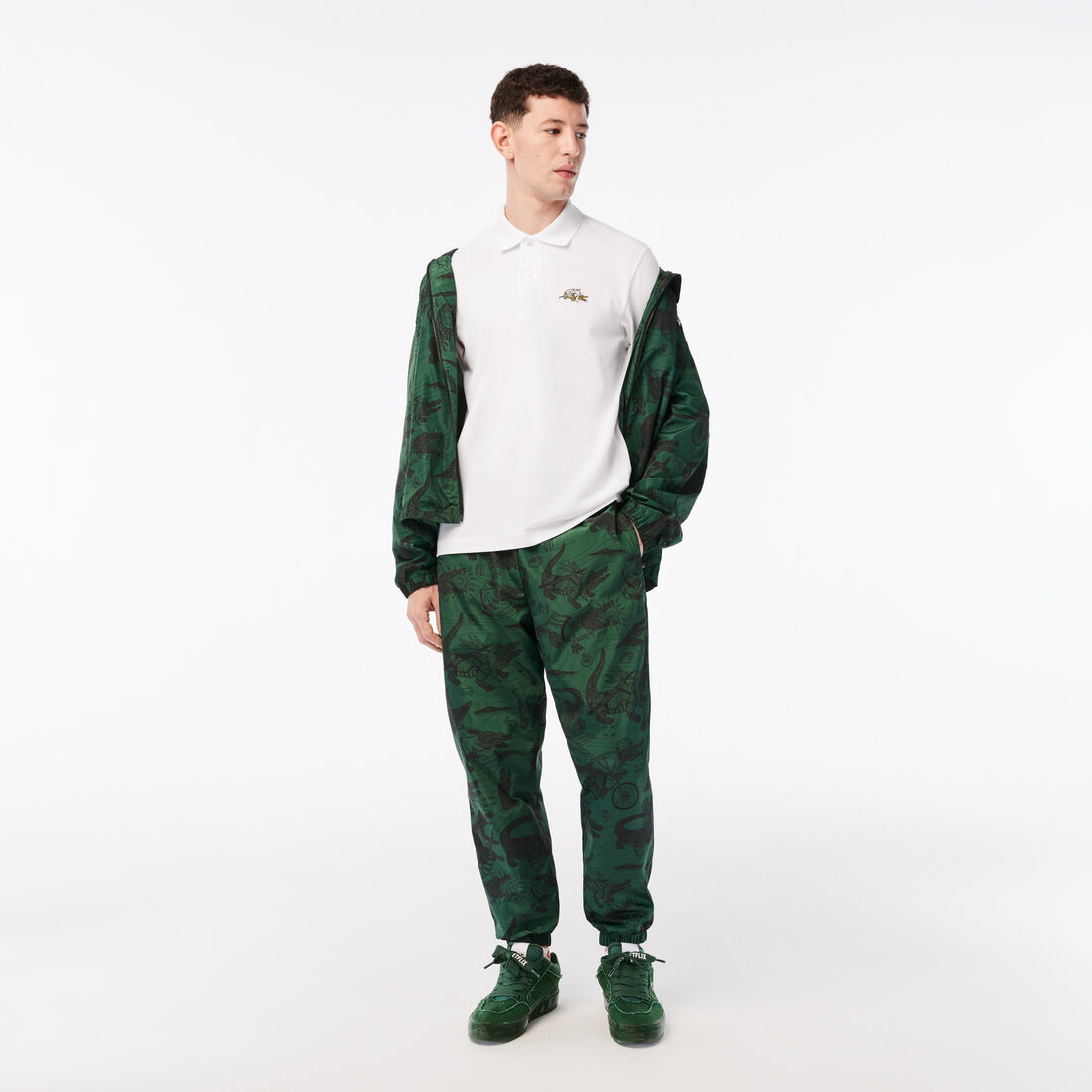 تيشيرت بولو قطن عضوي للرجال مجموعة Lacoste x Netflix تيشيرت بولو قطن عضوي للرجال مجموعة Lacoste x Netflix