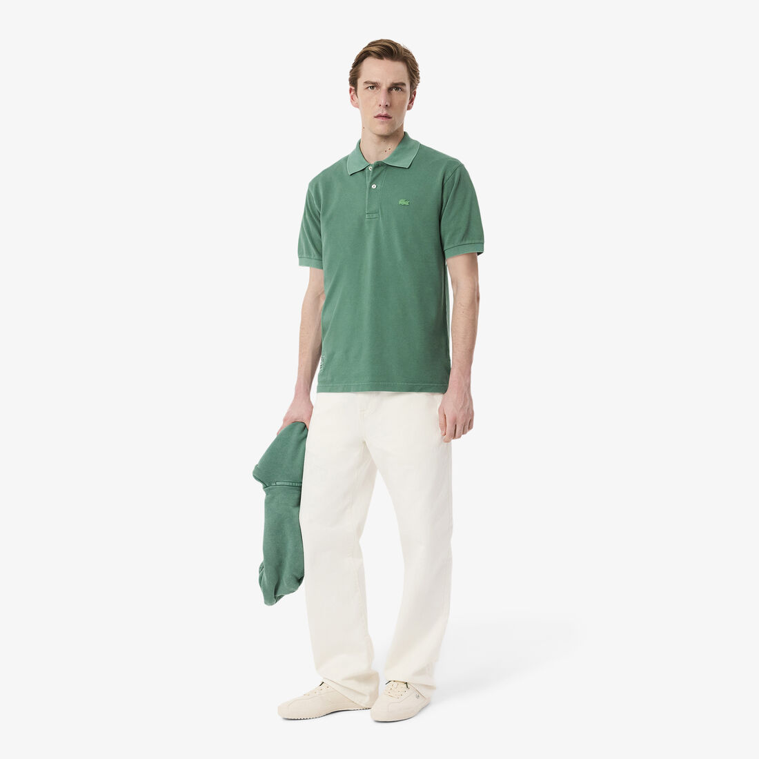 قميص بولو بقصة كلاسيكية L.12.12 ذو تأثير مغسول قميص بولو بقصة كلاسيكية L.12.12 ذو تأثير مغسول