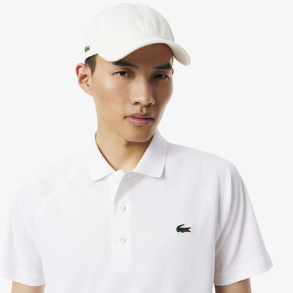 قميص بولو بقصّة عادية واقٍ من الأشعة فوق البنفسجية قميص بولو بقصّة عادية واقٍ من الأشعة فوق البنفسجية