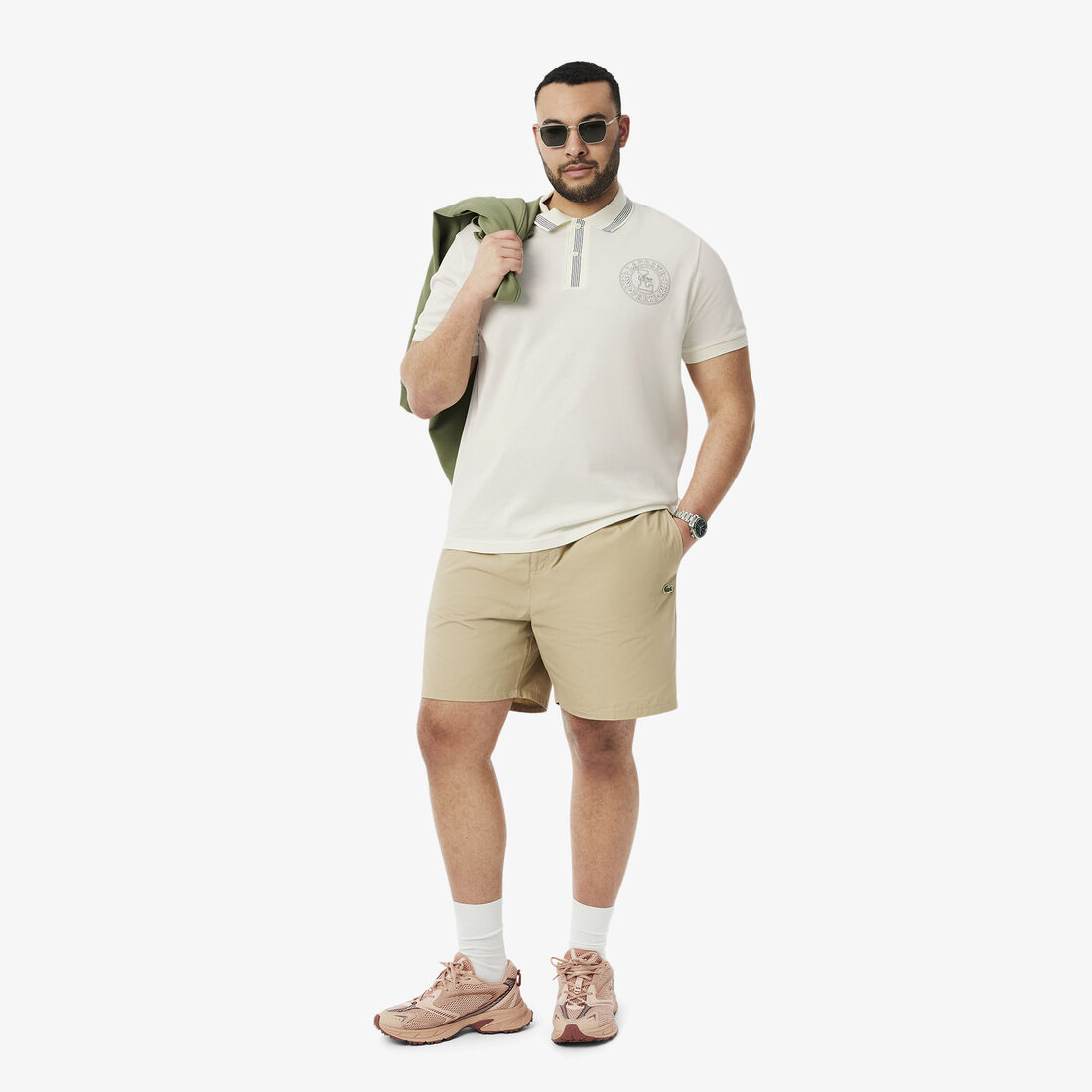 قميص بولو ذو قصة عادية L.12.12 بطبعة شارة قميص بولو ذو قصة عادية L.12.12 بطبعة شارة