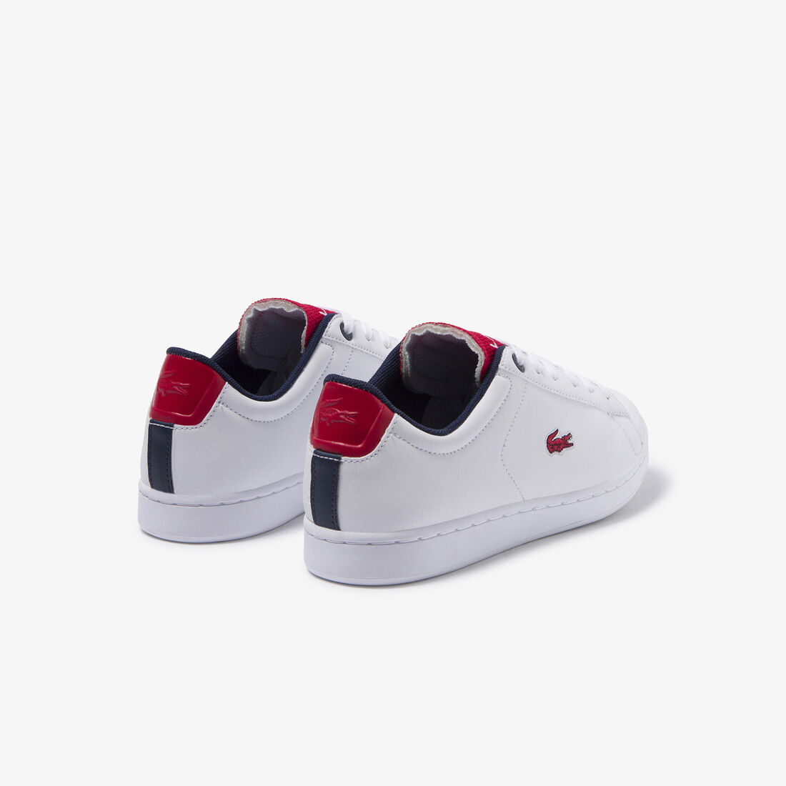 حذاء رياضي خفيف للشباب من مجموعة Carnaby Evo مصنوع من مواد صناعية وأربطة أنيقة وقماش حذاء رياضي خفيف للشباب من مجموعة Carnaby Evo مصنوع من مواد صناعية وأربطة أنيقة وقماش