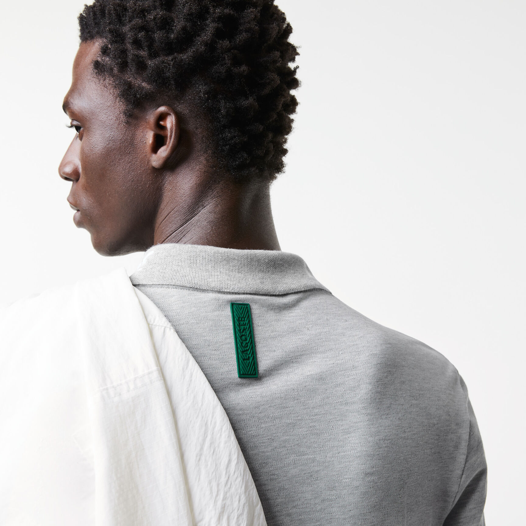 تيشيرت بولو لاكوست بيكيه مطاطي بقصة ضيقة وشعار الماركة للرجال