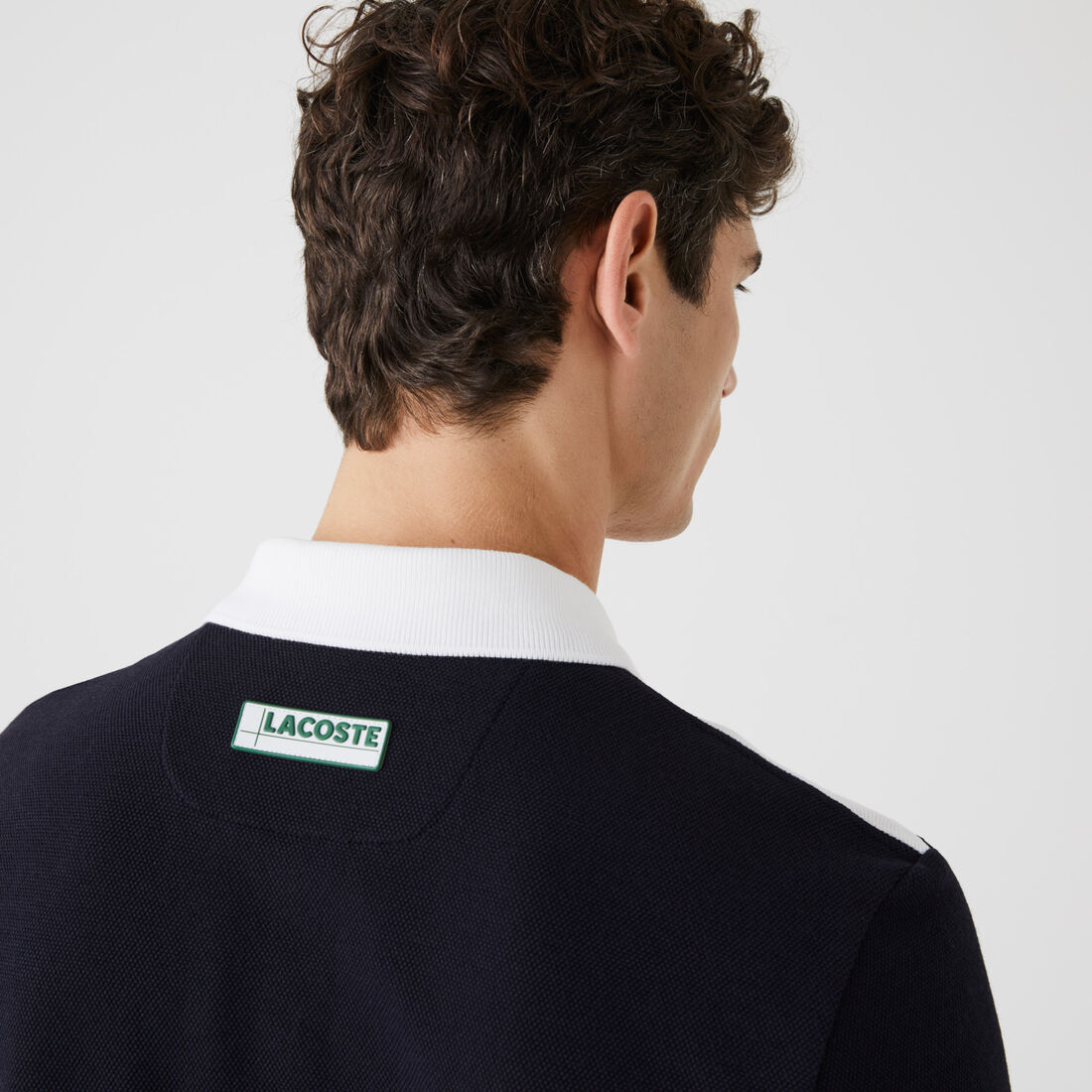 Men's Lacoste Regular Fit Geometric Colourblock Piqué Polo Shirt Men's Lacoste Regular Fit Geometric Colourblock Piqué Polo Shirt