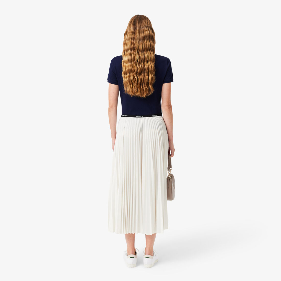 تنورة طويلة مطوية بخصر مطاطي تنورة طويلة مطوية بخصر مطاطي