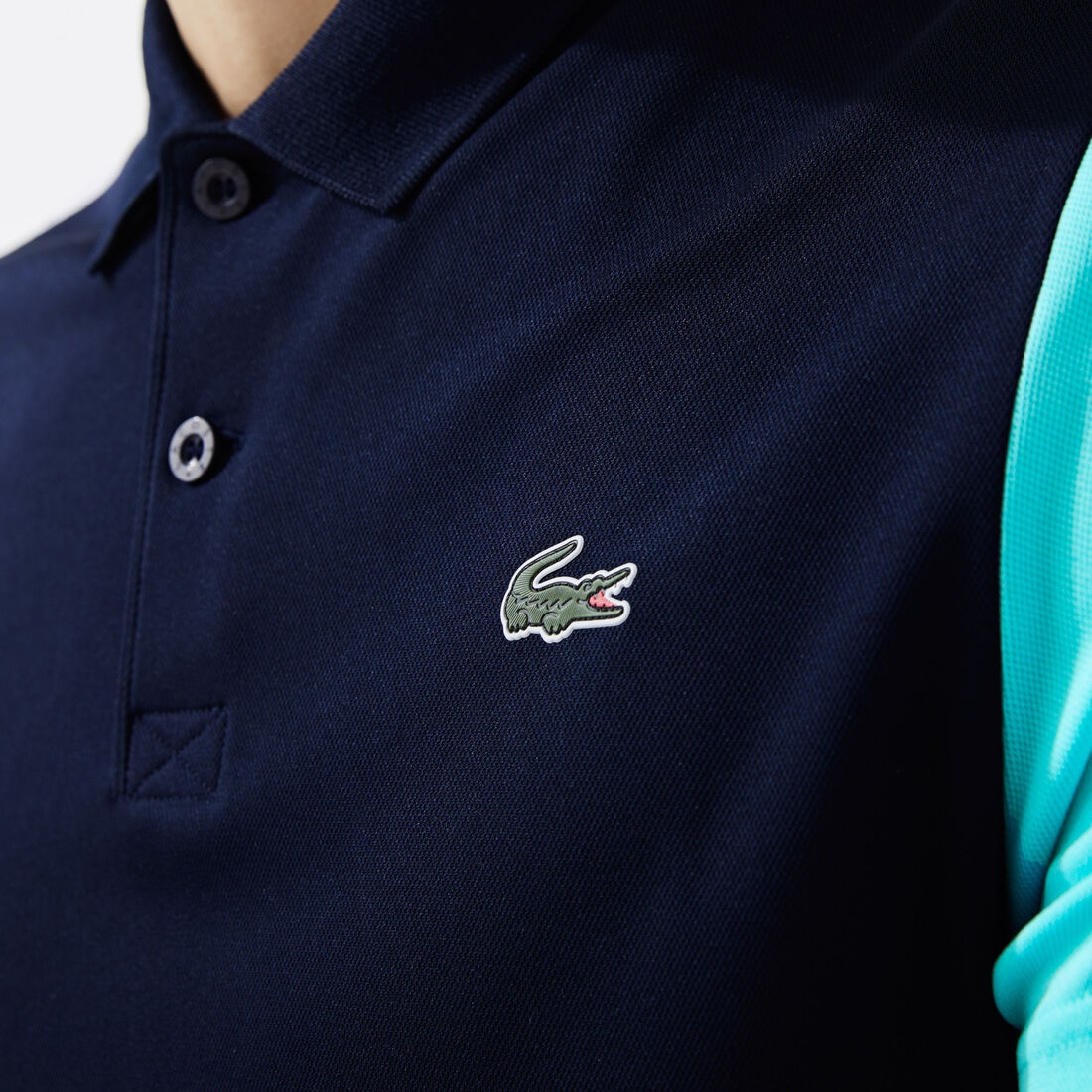 قميص بولو من مجموعةLacoste SPORT محيك من البيكيه ويسمح بمرور الهواء للرجال قميص بولو من مجموعةLacoste SPORT محيك من البيكيه ويسمح بمرور الهواء للرجال