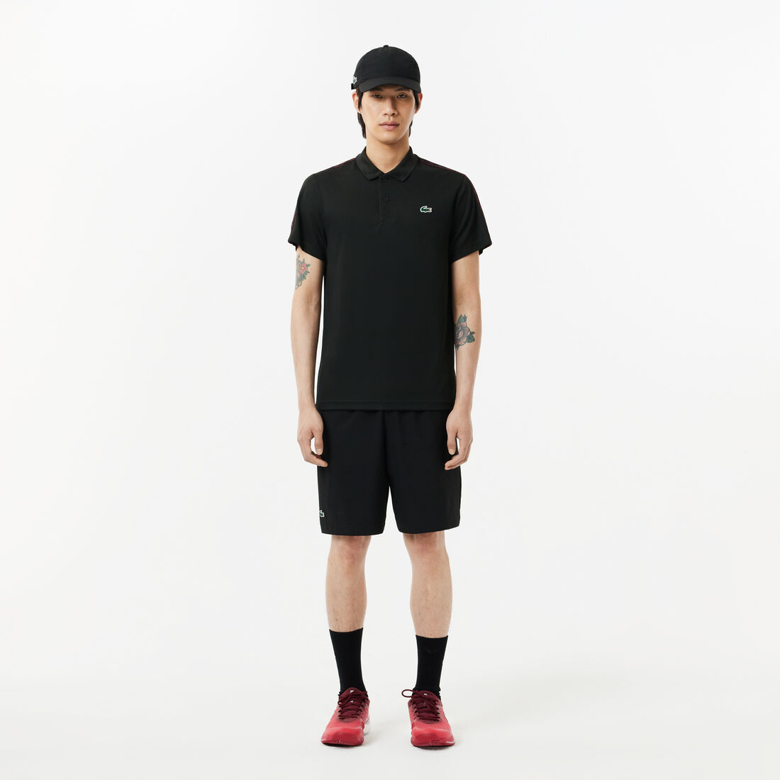 قميص بولو للتنس مخطط بشعار الماركة فائق الجفاف قميص بولو للتنس مخطط بشعار الماركة فائق الجفاف