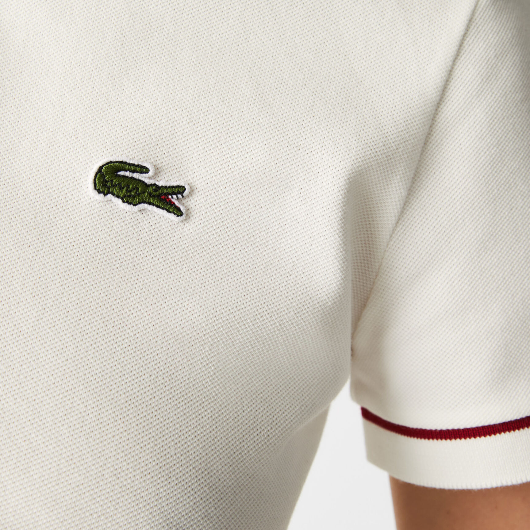 قميص بولو نسائي مصنوع في فرنسا من قطن بيكيه العضوي بقصة ضيقة