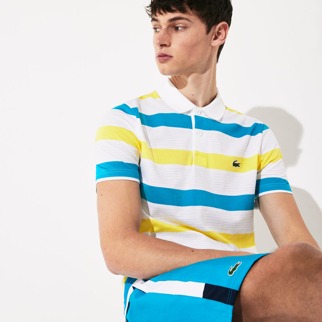 قميص بولو من مجموعة Lacoste SPORT مخطط ومحيك من قطن فائق الخفة للرجال قميص بولو من مجموعة Lacoste SPORT مخطط ومحيك من قطن فائق الخفة للرجال