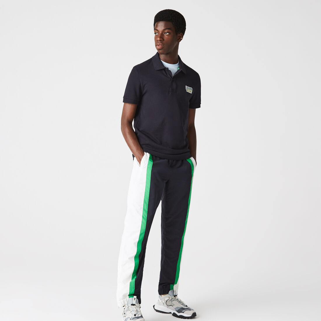 بولو Lacoste للرجال بقصّة عادية من قطن بيكيه بولو Lacoste للرجال بقصّة عادية من قطن بيكيه