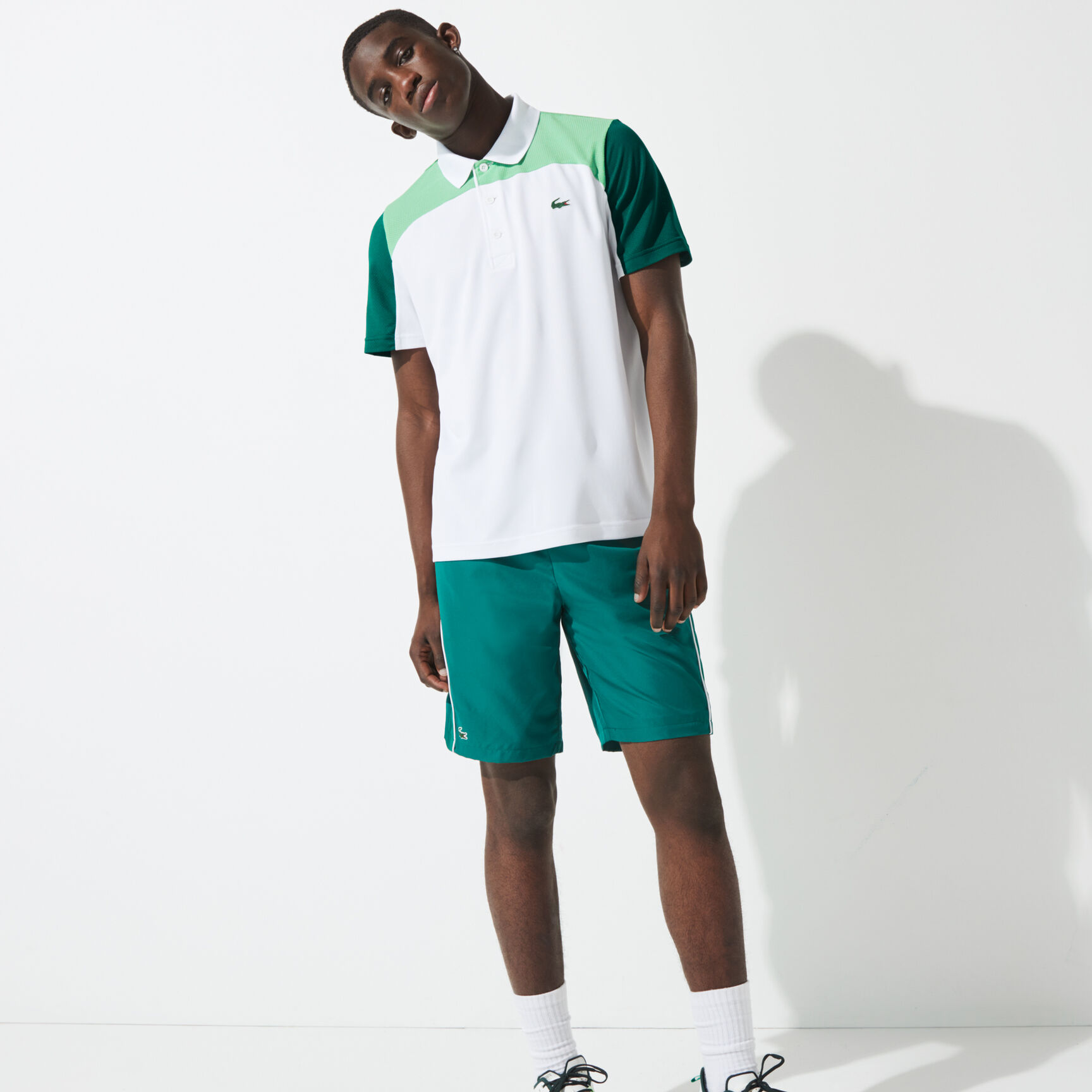 قميص بولو مسامي للتنس للرجال مع كتل لونية مجموعة Lacoste SPORT