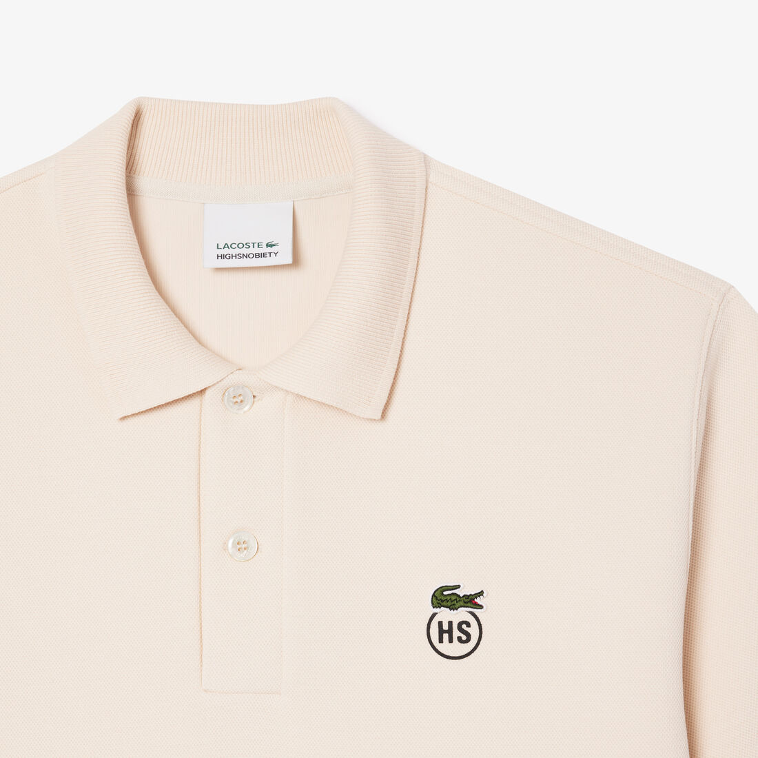 قميص بولو بيكيه كبير الحجم من Lacoste x Highsnobiety قميص بولو بيكيه كبير الحجم من Lacoste x Highsnobiety