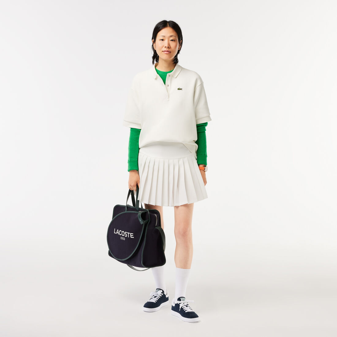 تنورة تنس بيكيه مع شورت تحتي مثبت بها تنورة تنس بيكيه مع شورت تحتي مثبت بها