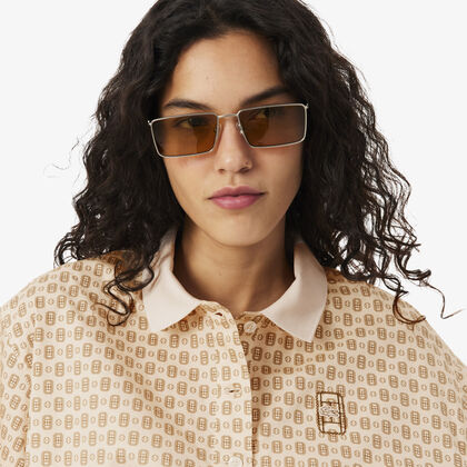 lacoste oversized tennis print polo