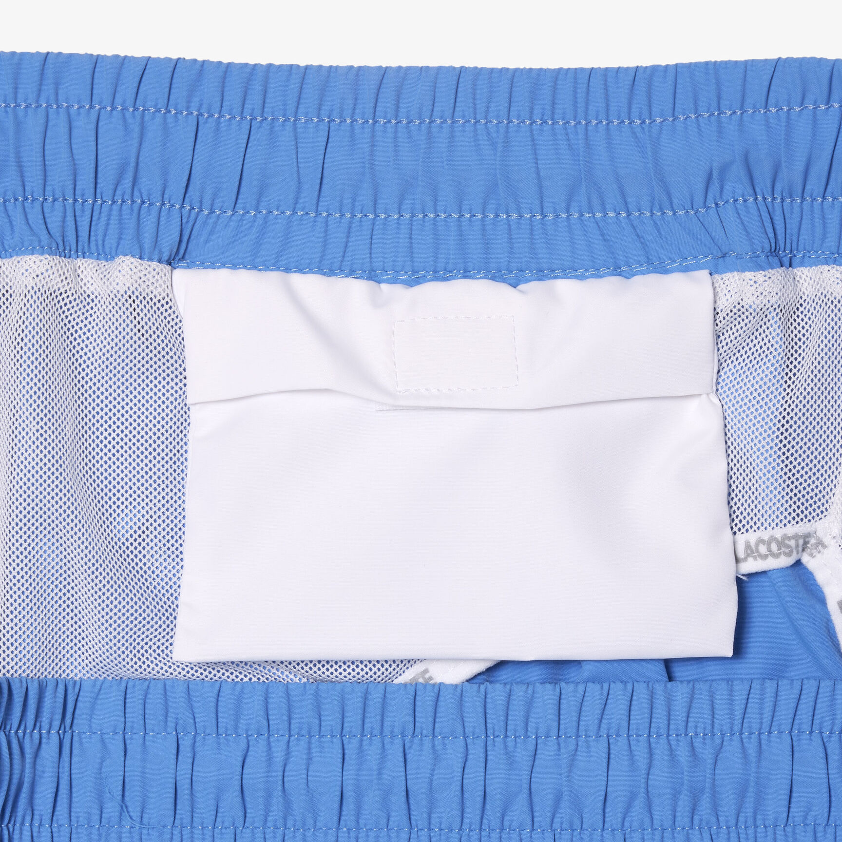 شورت سباحة لاكوست سريع الجفاف ببطانة مدمجة للرجال شورت سباحة لاكوست سريع الجفاف ببطانة مدمجة للرجال