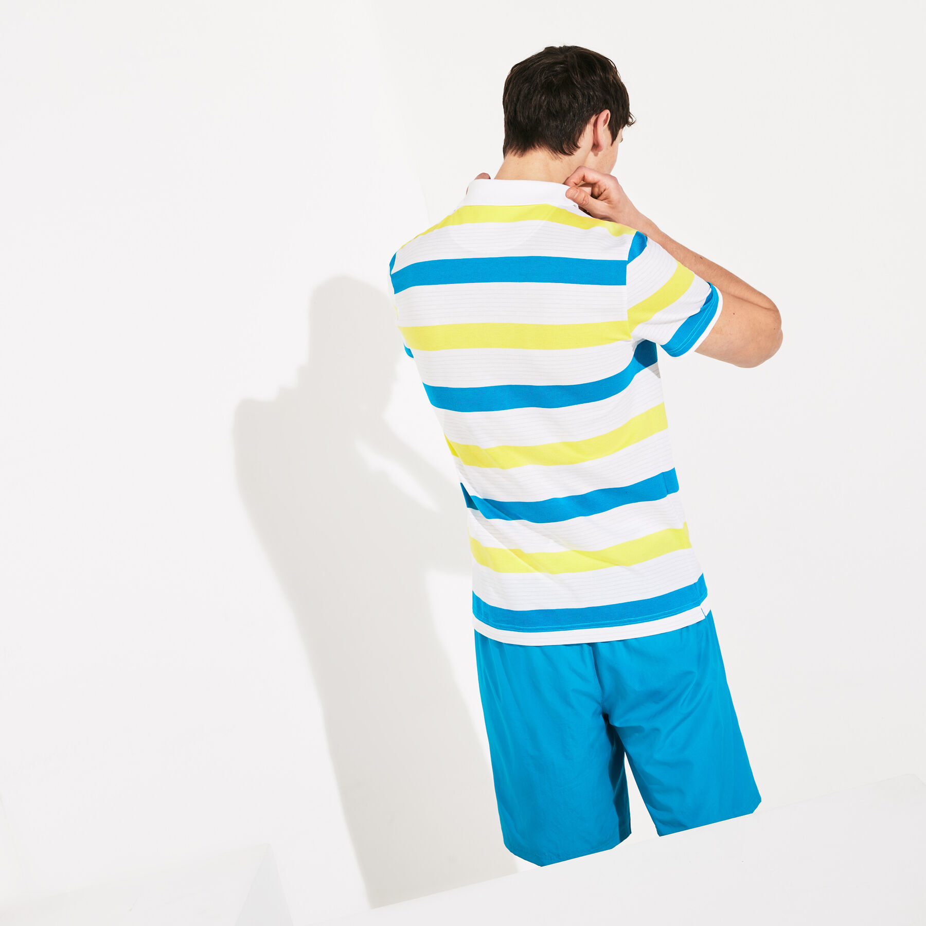 لاكوست قميص بولو من مجموعة lacoste sport مخطط ومحيك من قطن فائق الخفة للرجال