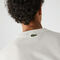 لاكوست تي شيرت قطن مع طبعة وجه مميزة من مجموعة lacoste live للجنسين