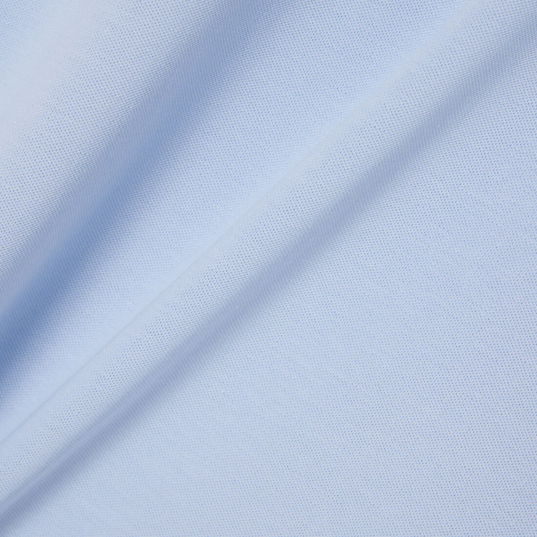 قميص بولو بيكيه خفيف بقصة كلاسيكية L.12.12 قميص بولو بيكيه خفيف بقصة كلاسيكية L.12.12