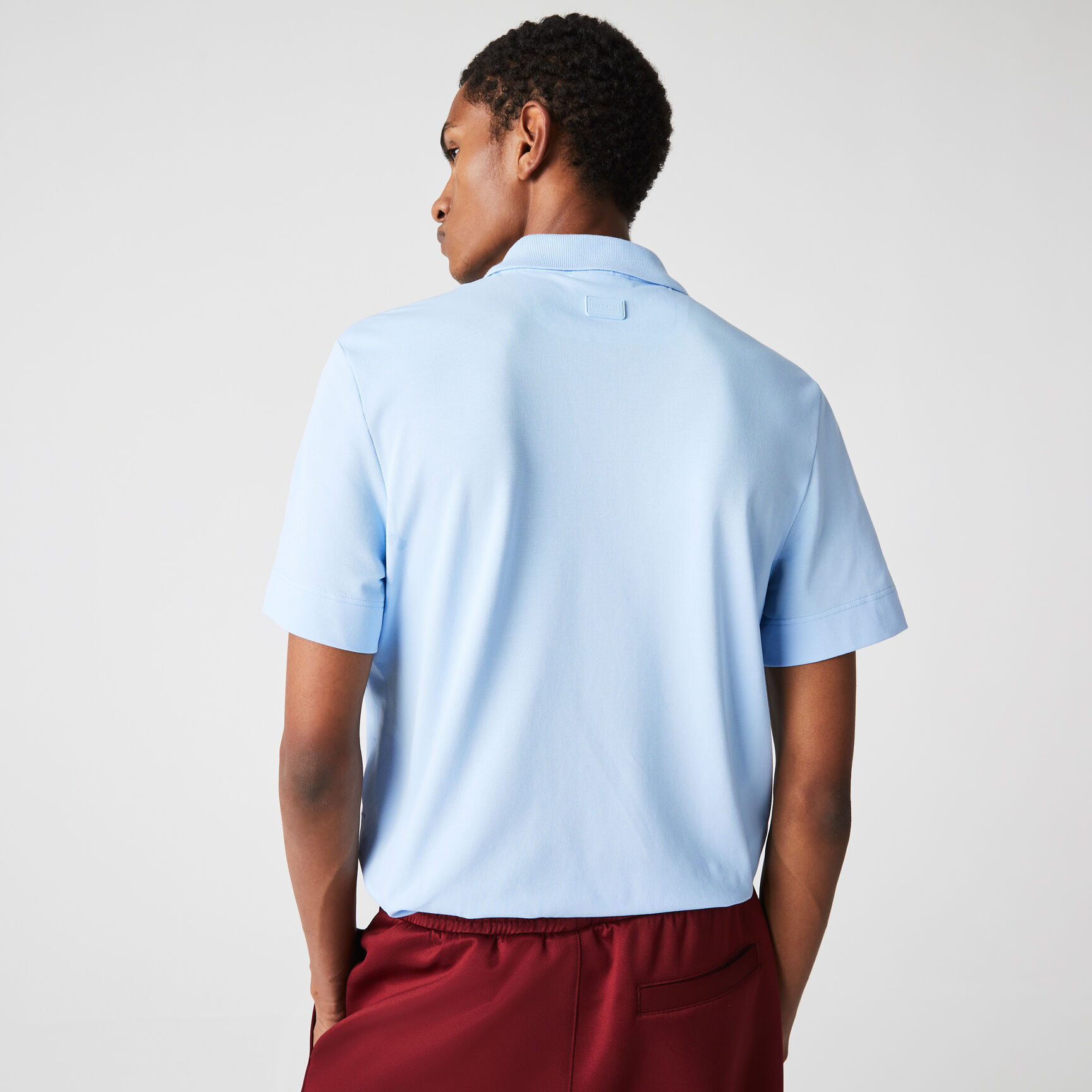بولو بيكيه الخفيف المسامي للرجال من Lacoste بولو بيكيه الخفيف المسامي للرجال من Lacoste