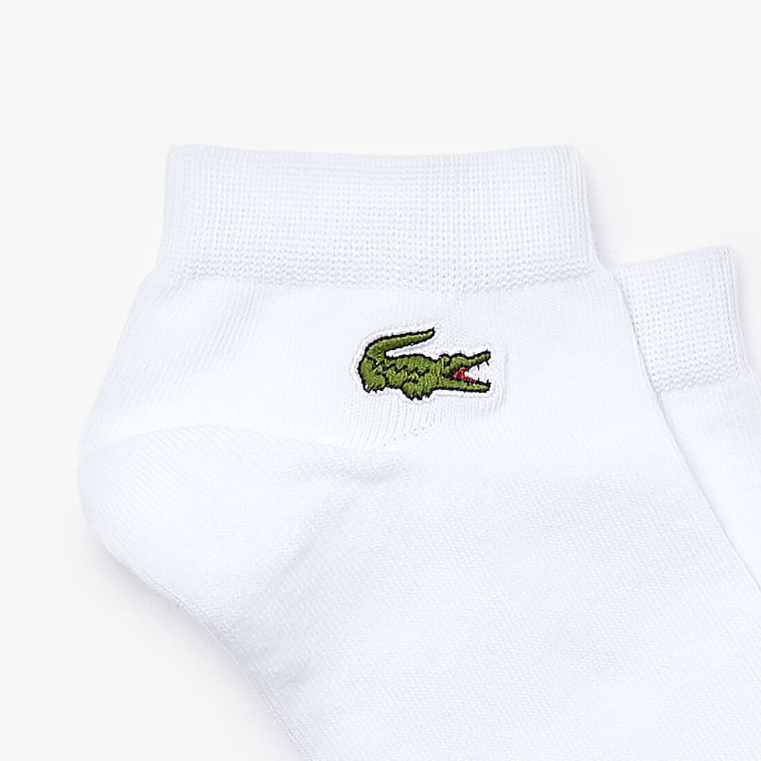ثلاثة أزواج من جوارب Lacoste القصيرة المحيكة من الجيرسيه للرجال ثلاثة أزواج من جوارب Lacoste القصيرة المحيكة من الجيرسيه للرجال