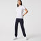 قميص بولو بأنماط مونوغرام وقصة ضيقة مجموعة Lacoste LIVE للنساء قميص بولو بأنماط مونوغرام وقصة ضيقة مجموعة Lacoste LIVE للنساء