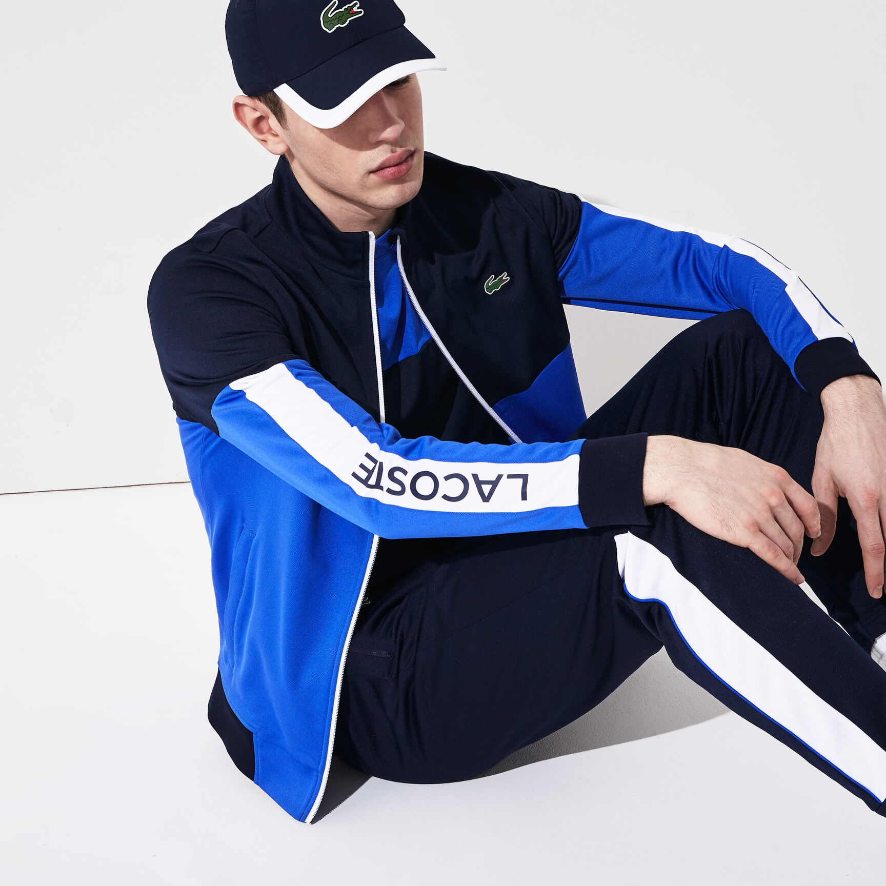 قميص ثقيل بسحاب من البيكيه المقاوم للمياه متعدد الألوان من مجموعة Lacoste SPORT للرجال قميص ثقيل بسحاب من البيكيه المقاوم للمياه متعدد الألوان من مجموعة Lacoste SPORT للرجال