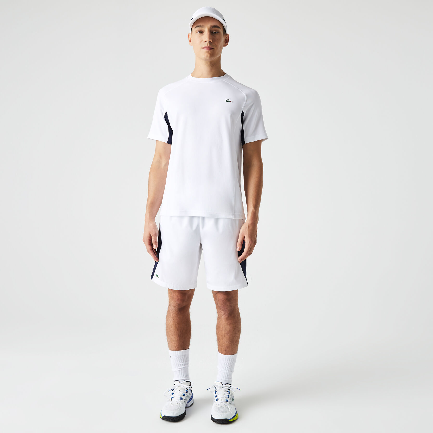 لاكوست تيشيرت تنس بيكيه سريع الجفاف بتصميم مقسم بألوان للرجال مجموعة lacoste sport