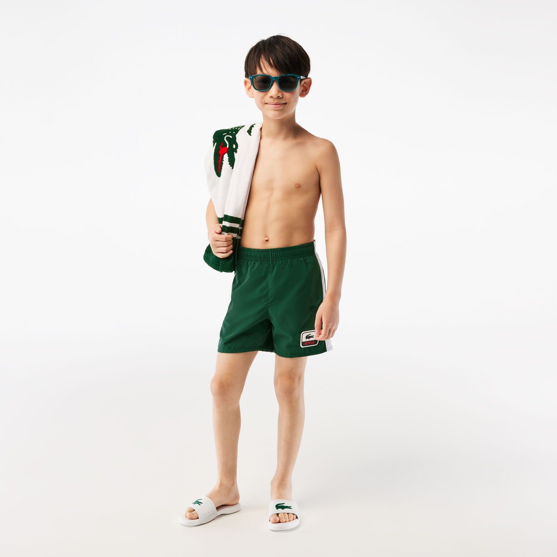 boy s lacoste x netflix contrast badge swim trunks
