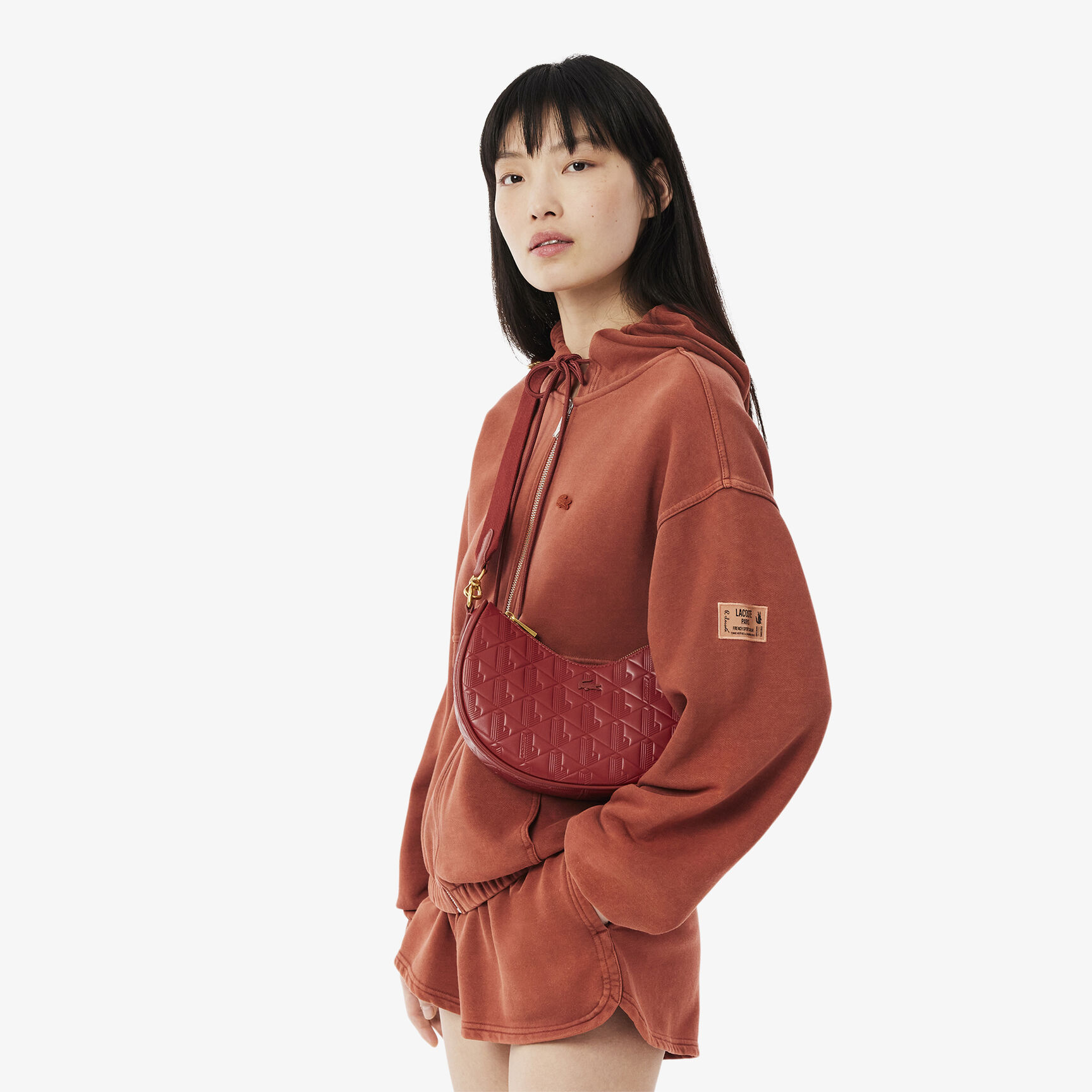 محفظة ماهيكي الجلدية المنقوشة على شكل نصف قمر