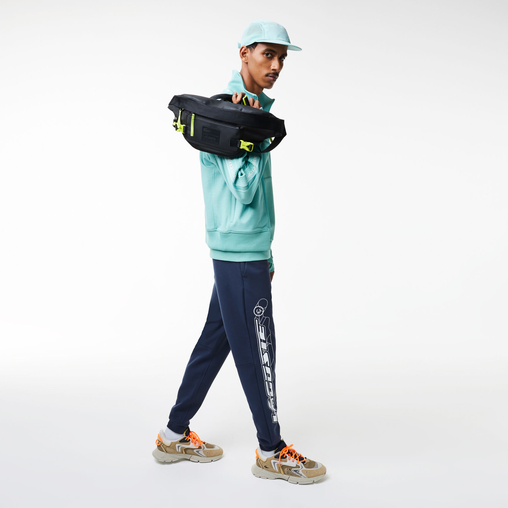 حقيبة خصر لاكوست بتصميم مقاوم لزخات الماء للرجال حقيبة خصر لاكوست بتصميم مقاوم لزخات الماء للرجال