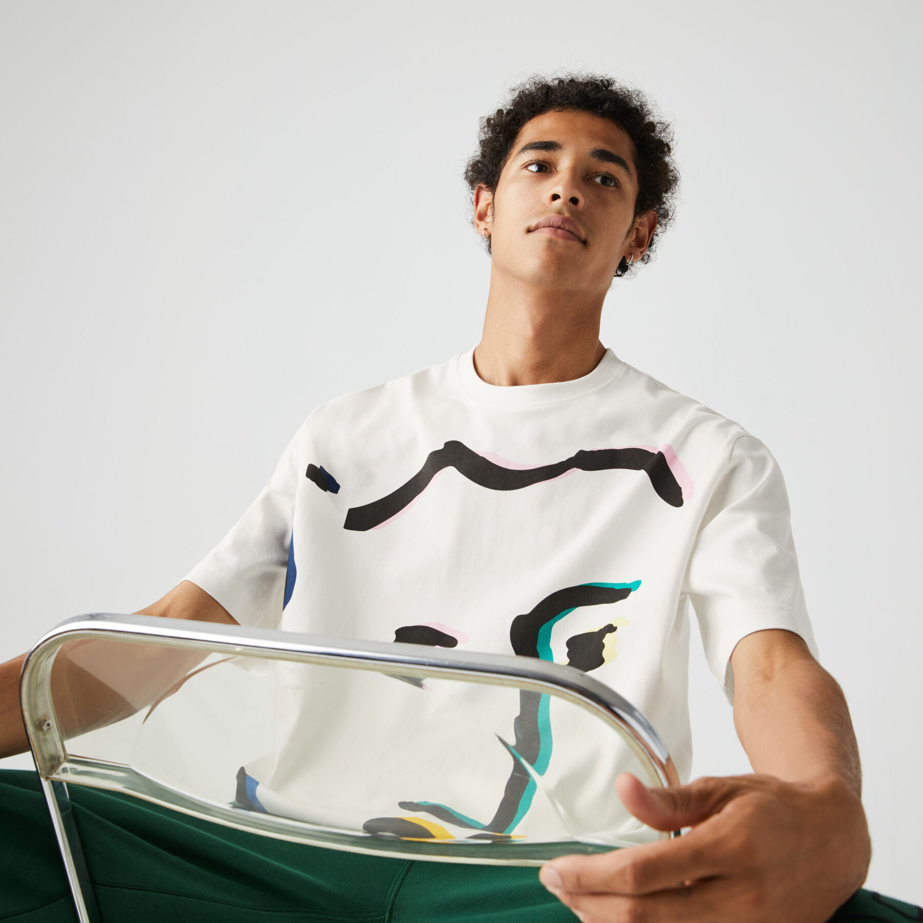 لاكوست تي شيرت قطن مع طبعة وجه مميزة من مجموعة lacoste live للجنسين
