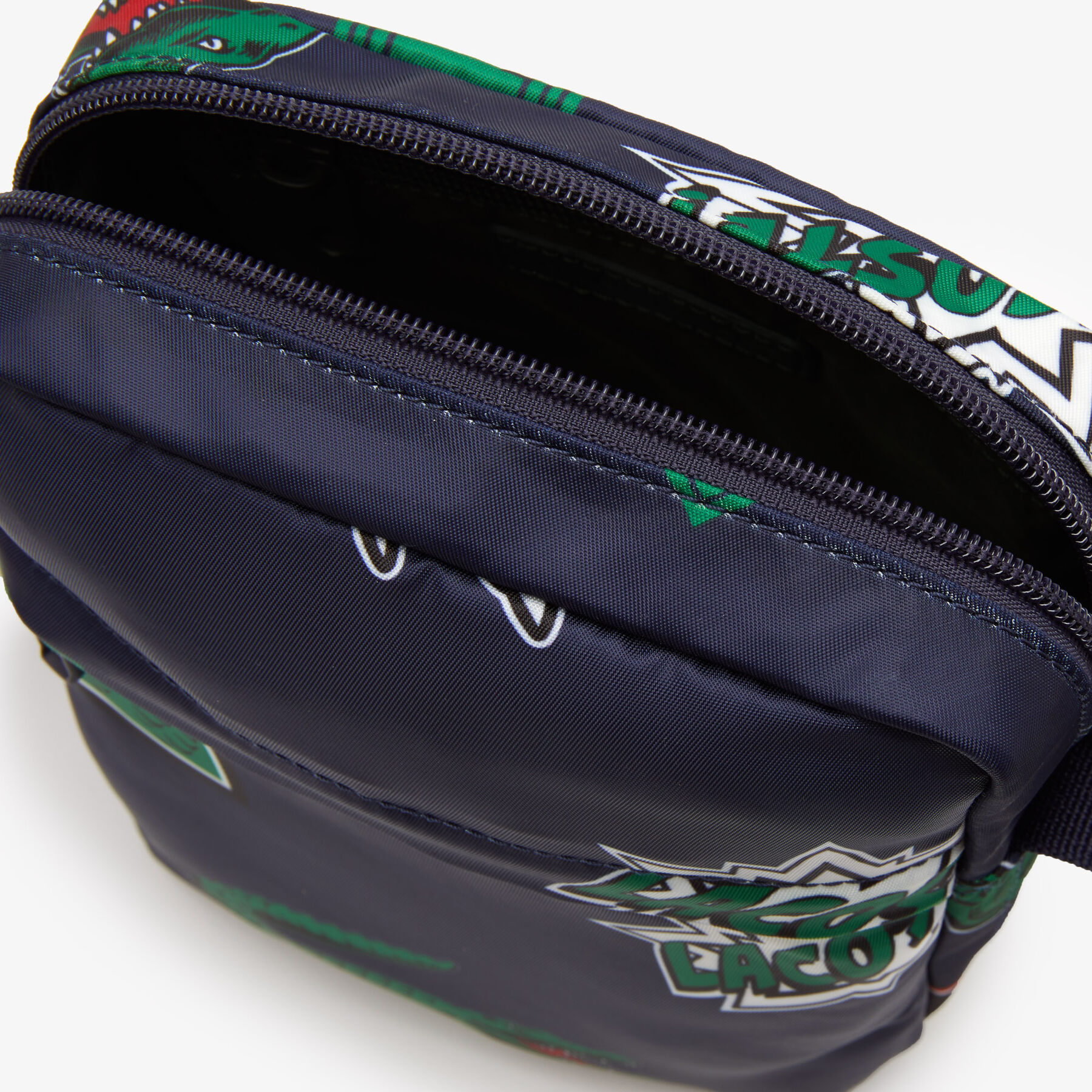 men s lacoste holiday comic print vertical camera bag