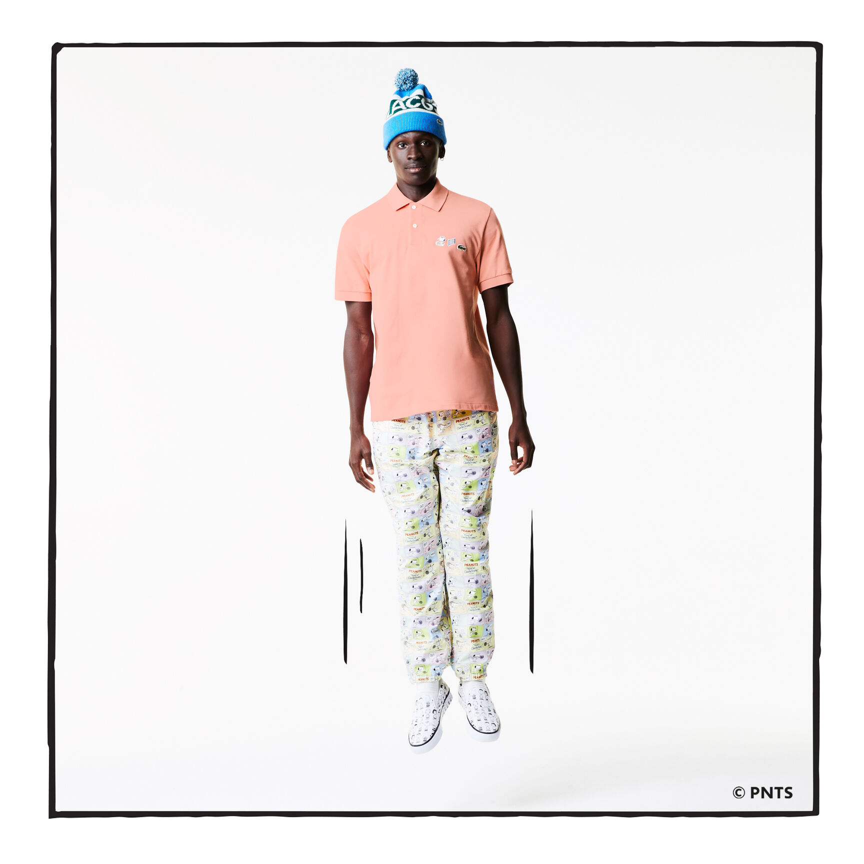 قميص بولو من القطن العضوي الرجالي من مجموعة Lacoste x Peanuts قميص بولو من القطن العضوي الرجالي من مجموعة Lacoste x Peanuts